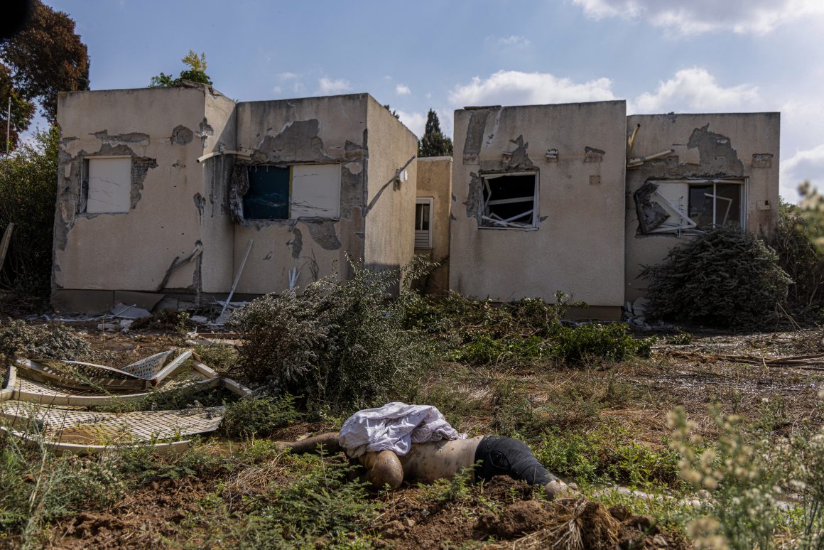 A dead body is seen after the Operation by the Palestinian group Hamas in Kfar Aza, Israel.